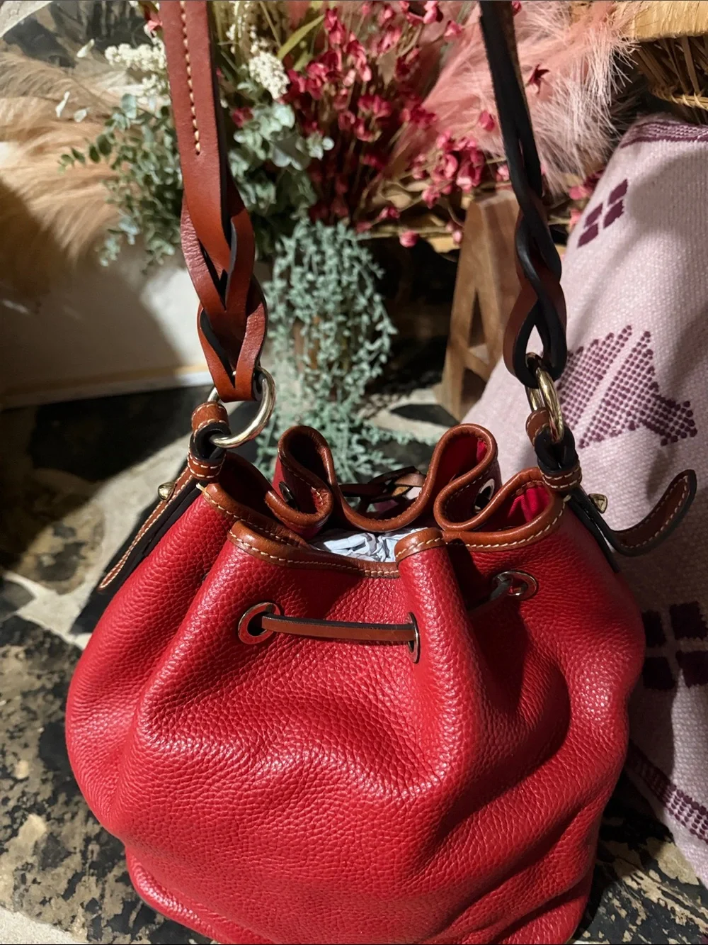 Dooney & Bourke Red Pebbled Leather Drawstring Bucket with Brown Trim